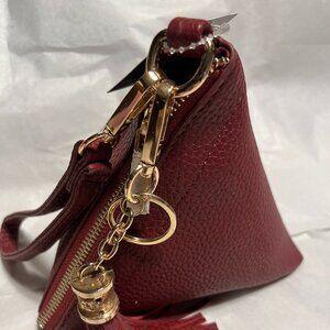 Super cute Triangle wristlet purse burgundy and gold NWT